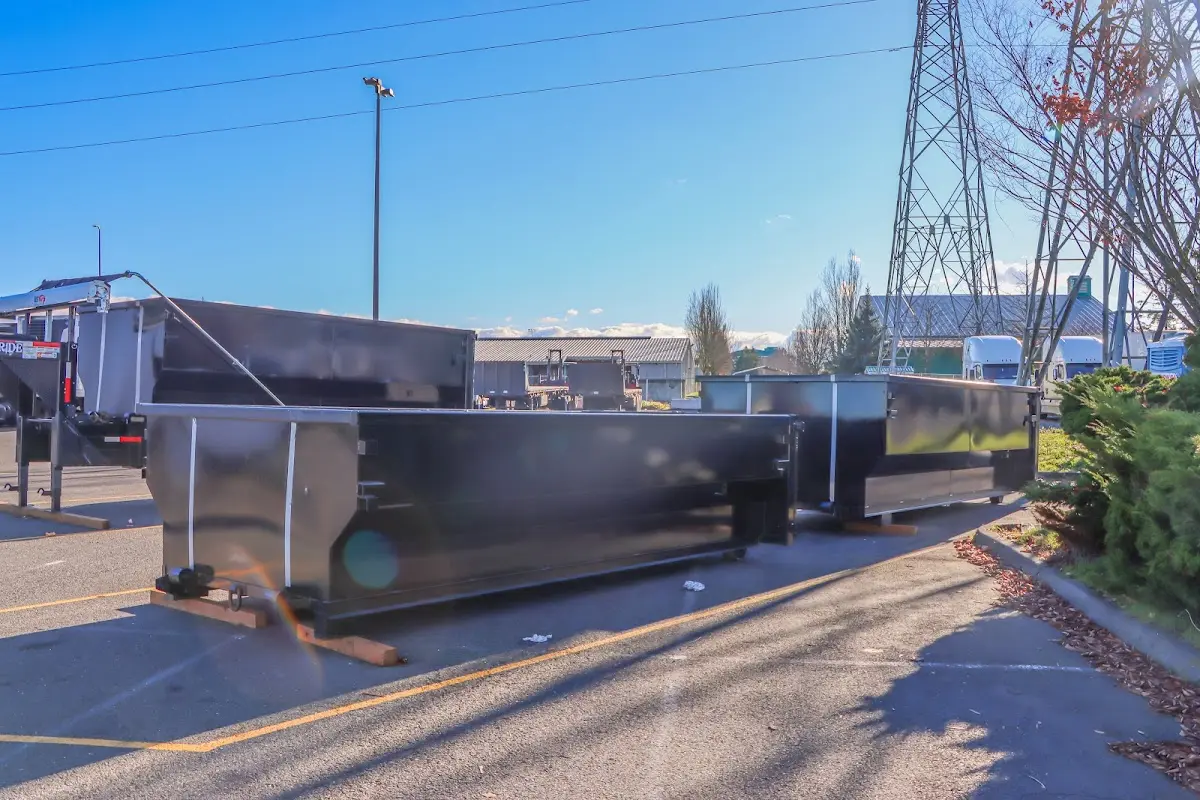 Roll-off dumpster ready for waste disposal at job site for Commercial Dumpster Rental in Jackson